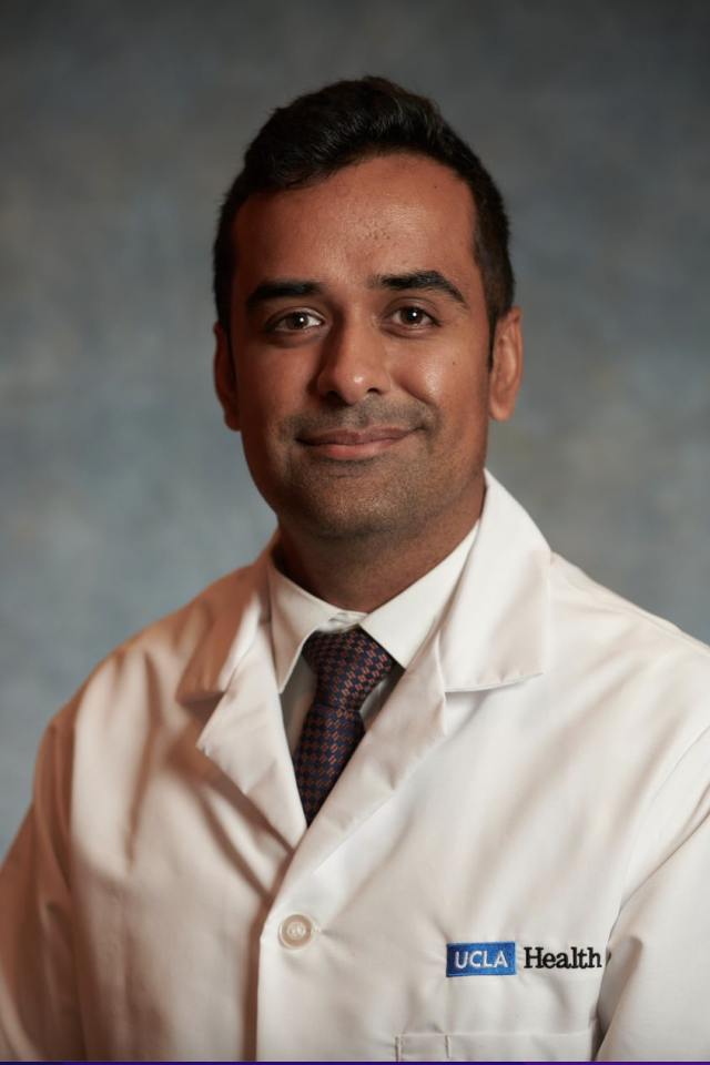 headshot of Shaundeep Sekhon, MD wearing a white lab coat in front of a gray background