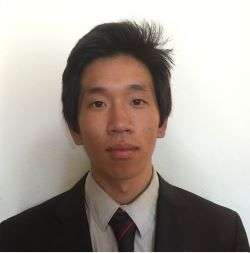  Jonathan Lyu wearing a suit and tie against a plain background.