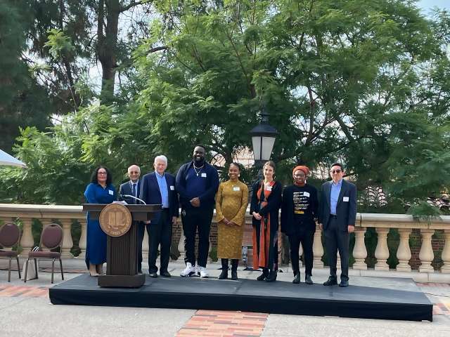 Dr. Adrissi receiving Racial and Social Justice grant