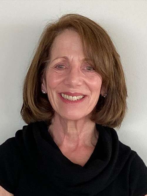 Headshot of randi jones smiling in an indoor setting