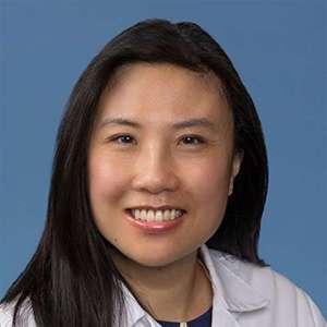 headshot of Kara Chew in white coat