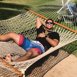 Mark Guirguis relaxing in a hammock