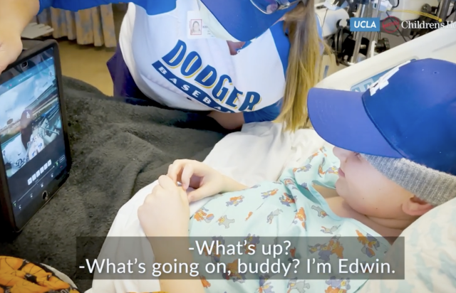 Pediatric patients use robot to "run the bases" at Dodger Stadium