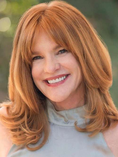 Lori Weintraub smiling in an outdoor setting