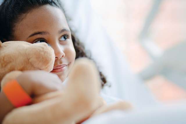 Girl with teddy bear