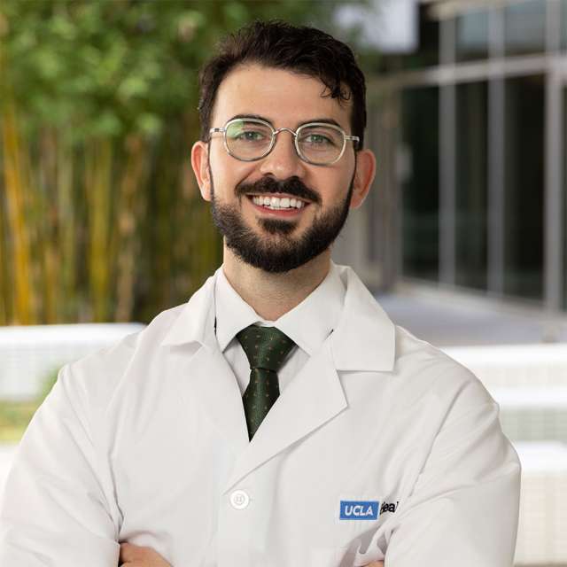 Dr. Basil Chaballout standing outside with a friendly smile.