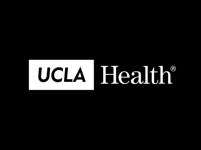 UCLAH logo white on black background with register mark