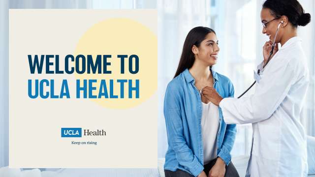 Doctor checking a female patient's heartbeat