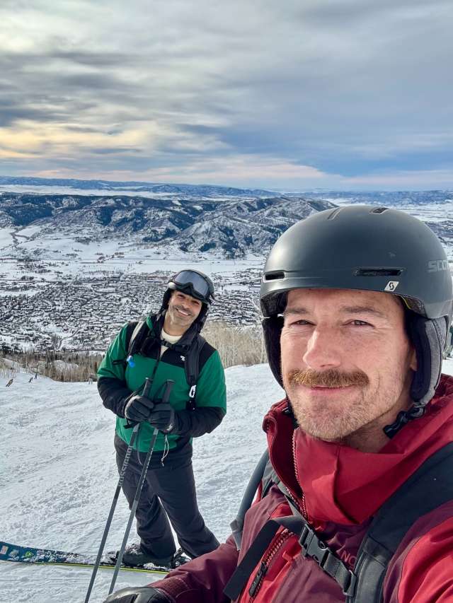 Dr. Dane Saksa and husband, Ryan, skiing on vacation
