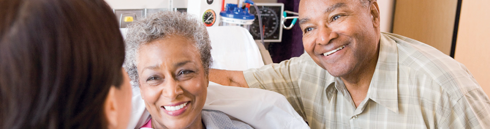 Physician discusses medical information with patkents