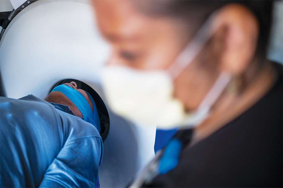 The patient undergoes a computed tomography scan of the brain.
