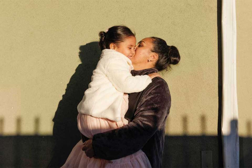 Sofia Ruiz kissing her daughter, Maya.