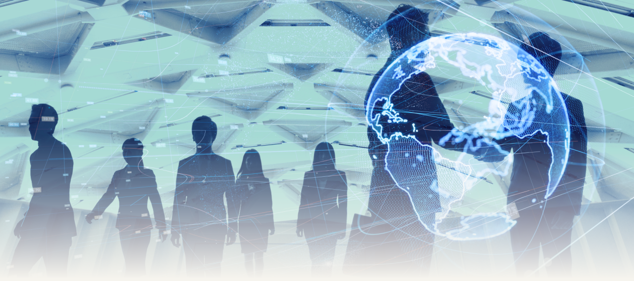 Silhouettes of business men and women, with two business men shaking hands and a semi transparent silhouette of the world in front of them.