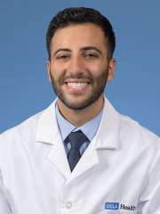 A headshot of George Mina, MD