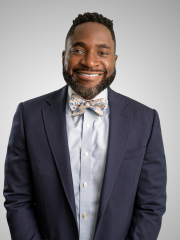 Profile photo of Dr. Essien smiling