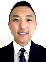 headshot of Dr. Sohn Kim in black suit