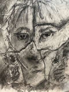 Katy Kearny depicts putting her broken self back together with torn paper and staples, during an art therapy session. 