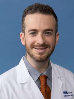 Guy A. Weiss, MD