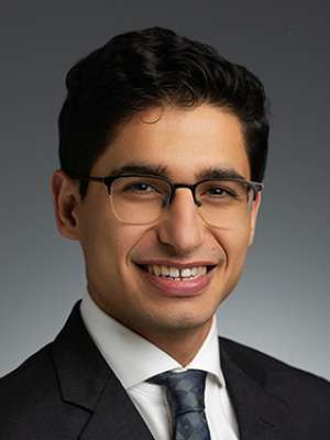 Head shot of Rafael Maarek, MD in a business suit, smiling at camera