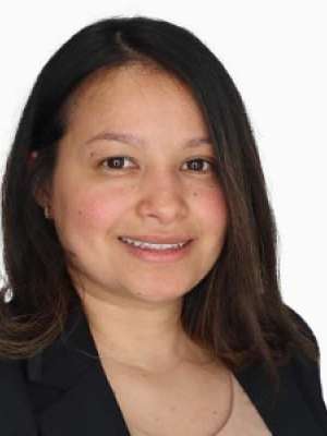 Karina Alas Marroquin, smiling headshot wearing a dark blazer