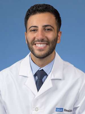 A headshot of George Mina, MD