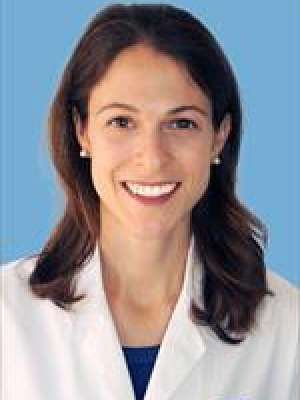 headshot of Melissa Lechner in white lab coat