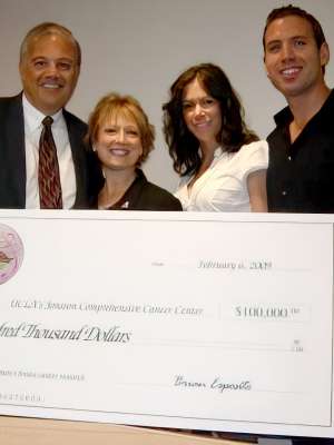 JoAnn Esposito with supporters at check presentation for Par for the Cure
