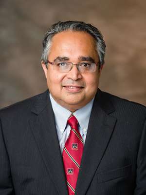 Dr. Puneet Dhawan