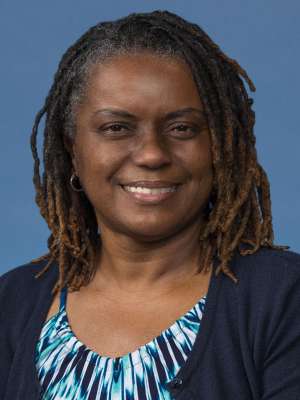 headshot of Jacqueline Pious Gaines in black cardigan