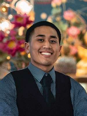 Headshot of Troy Thiratalerngkiat.