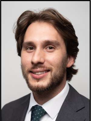 headshot of Anthony Loffredo wearing a black suit in front of a white background