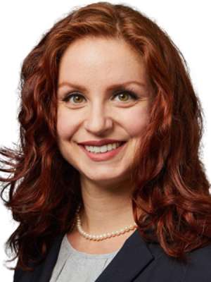 headshot of Dr. Christina Tripsas in black jacket.