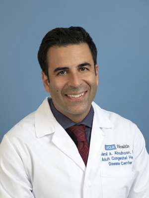 Jamil A. Aboulhosn, MD smiling portrait in white coat