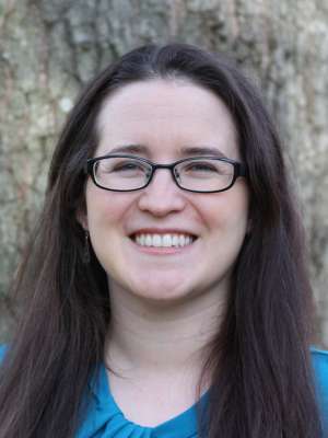 Headshot of Dr. Jaime La Charite in blue blouse