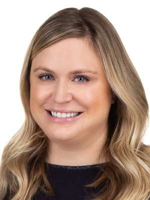 headshot of Dr. Elizabeth Hutchins in black blouse