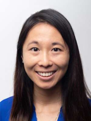 headshot of Jennifer Tram in blue blouse