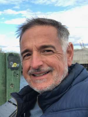 David Sampson outdoors smiling at the camera