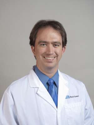 Timothy E. Weiss, MD