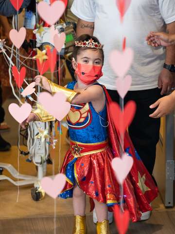 Pediatric Patient, Stella receives a surprise superhero party