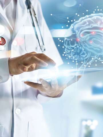 Doctor checking brain testing result with computer interface, innovative technology in science and medicine concept