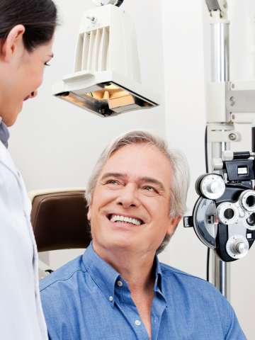 Optometrist with patient
