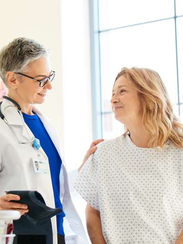Female doctor with female patient