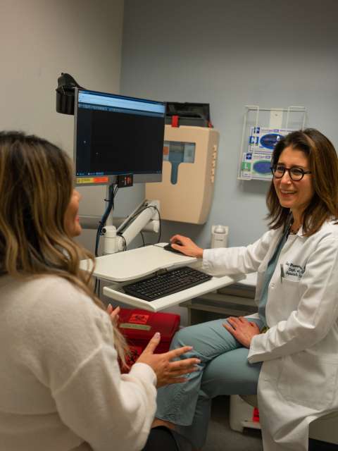 Dr. Sanaz Memarzdeh consulting with patient Grace Geaga