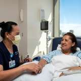 Nurse attending a patient in Ronald Reagan UCLA Medical Center