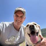Man and dog on hiking trail