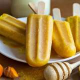 4 popsicles on a plate