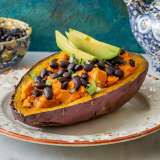 Baked Sweet Potato with Black Beans on a plate