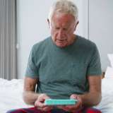 Man in hospital room