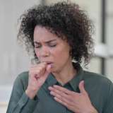woman lingering coughing