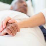 Older man in hospital bed